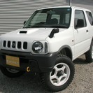  スズキ ジムニー 660 XA 4WD　リフトアップ （ホワイ...