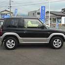  三菱 パジェロミニ 660 VR　・AW・背面タイヤ・ナビ新品 （ブラックツートン） クロカン・ＳＵＶ　軽自動車の画像