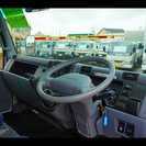  三菱 キャンター 3.4t 全低床 超ロング 4段セルフクレーン　 （白） トラックの画像