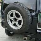  スズキ ジムニー 660 ワイルドウインド 4WD　 （ブラック） クロカン・ＳＵＶ　軽自動車の画像
