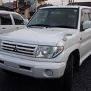  三菱 パジェロイオ 1.8 パールパッケージ 4WD　 （パー...