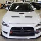  三菱 ランサーエボリューション 2.0 GSR X 4WD　18AW 車高調 （ホワイトパール） セダンの画像