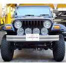  ジープ ラングラー スポーツ ソフトトップ 4WD　ディーラー車　リフトアップ　HDDナビ （ブラック） クロカン・ＳＵＶの画像