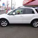  スズキ SX4 1.5XG 4WD　SDナビ （パール） ハッチバックの画像