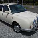  光岡自動車 ビュート 1.0 デラックス　 （ベージュ） セダンの画像