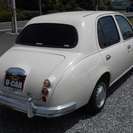  光岡自動車 ビュート 1.0 デラックス　 （ベージュ） セダンの画像