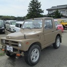  スズキ ジムニー 4WD　 （ブラウン） トラックの画像