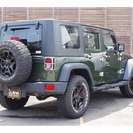  ジープ ラングラー アンリミテッド スポーツ 4WD　ディーラー車 4×4 M/Tタイヤ （ジープグリーンメタリッククリアコート） クロカン・ＳＵＶの画像
