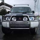  三菱 パジェロ 2.8 ミッドルーフワイド GI ディーゼルターボ 4WD　検30/5 4WD HDDナビ バックカメラ （ホワイト） クロカン・ＳＵＶの画像