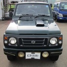  スズキ ジムニー 660 ワイルドウインド 4WD　 （グリー...