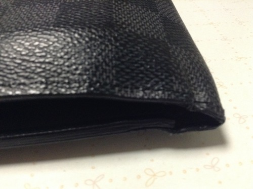 LOUIS VUITTONの二つ折り財布（メンズ）