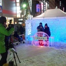 雪まつりススキノ会場（すすきのアイスワールド）での写真販売スタッ...