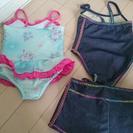 女子水着100サイズと浮き輪の画像