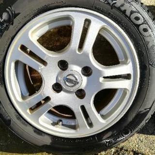 日産純正14インチアルミホイールタイヤの画像