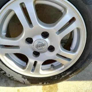 日産純正14インチアルミホイールタイヤの画像