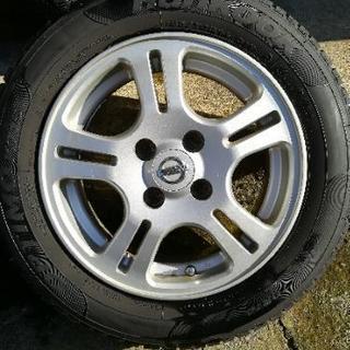 日産純正14インチアルミホイールタイヤの画像