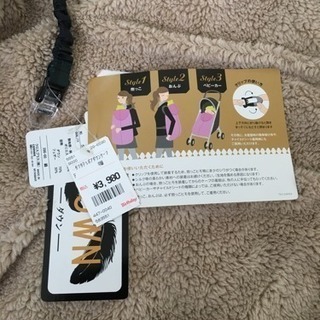 新品 ダウン入りリバーシブルケープの画像