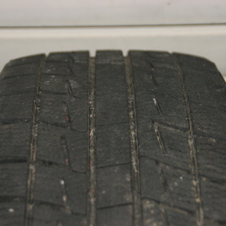BRIGESTONEスタッドレスタイヤホイールセット195/65R15中古バリ山◆日産センターキャップ付き5H114の画像