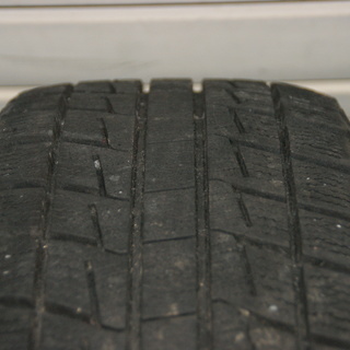 BRIGESTONEスタッドレスタイヤホイールセット195/65R15中古バリ山◆日産センターキャップ付き5H114の画像