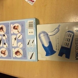 未使用携帯用ドライヤーと着脱式アイロンセットの画像