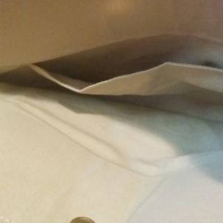 キラキラ手提げbag(シャラシャラ動く平らなビーズのような変わり素材)の画像