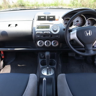 平成18年後期型フィット 走行距離57800km 検31.2 実走行 ETC 社外14AW 黒系内装 ウィンカー付ドアミラー キーレス 取説の画像