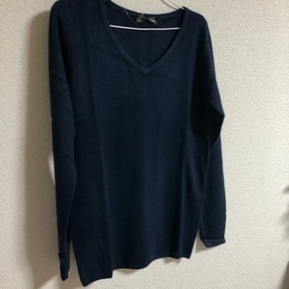 Vネック ニットの画像