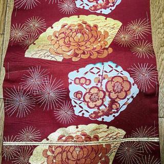 名古屋帯 扇菊梅文様 朱色 仕付け付きの画像