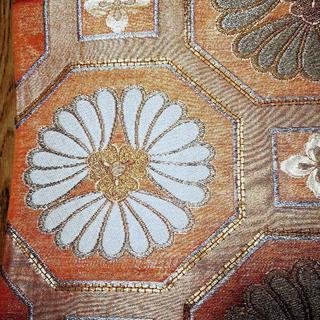    袋帯 六通 亀甲花文様 金コマ刺繍 オレンジの画像