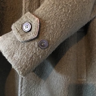 コート グリーン  フェルトの画像