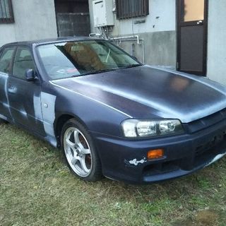 「現在、商談中。」カスタム中。バッテリー新品。ベース車にどうぞ。平成10年式 HR34スカイライン 4ドア 20GT AT車 検無し 原状渡し RAYS17インチホイール ※サイドステップ売却済、車輌のみとなります。の画像