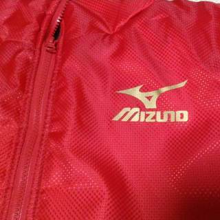 売却済【未使用】Mizuno 赤色ベンチコート サイズMの画像