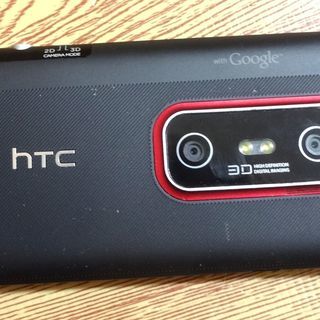 au HTI12 ブラック HTI12MKA HTC スマートフォン スマホ Android 携帯電話 白ロム KDDI CDMA 3D カメラの画像