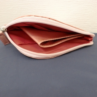 【100円シリーズ】ピンク色の新品未使用　ミニ財布の画像
