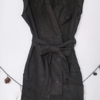 カーディガン、ベスト、ジーパンの画像