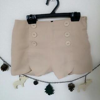 カーディガン、ベスト、ジーパンの画像