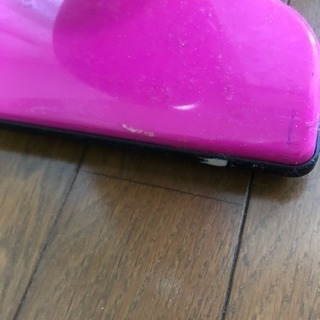 自立型 ピンクの掃除機の画像