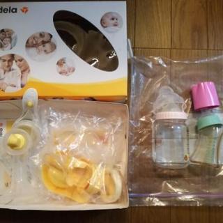 medelaの搾乳器と哺乳瓶2本