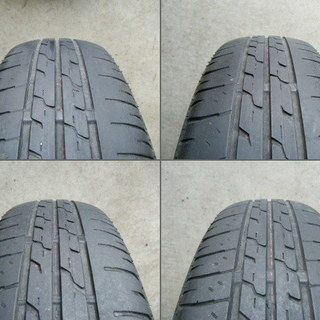 ダイハツ　純正アルミホイールタイヤセット 14インチ 4.5J PCD100 4穴 OFF+45　タイヤ155-65R14 です。の画像