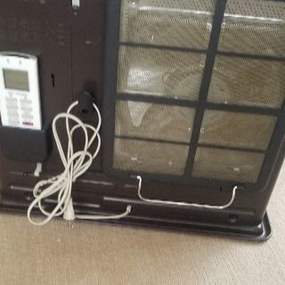 アラジン　石油ファンヒーター　リモコン、カバー付きの画像