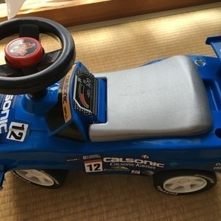 こども 足けり乗り物 ニッサンCALSONICの画像
