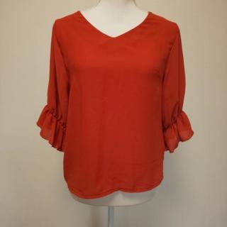 お取り置き中です。ロペピクニックのオレンジのブラウス？