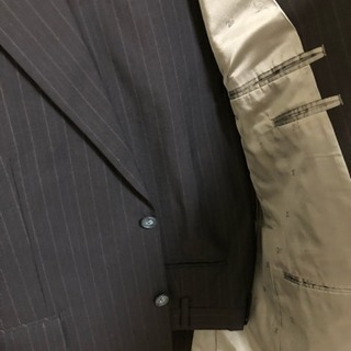 取引中 スーツ紺色の画像