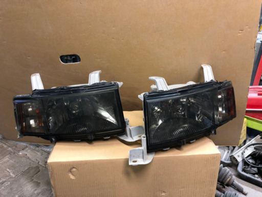 bB NCP31、35中古スモークヘッドライト右左