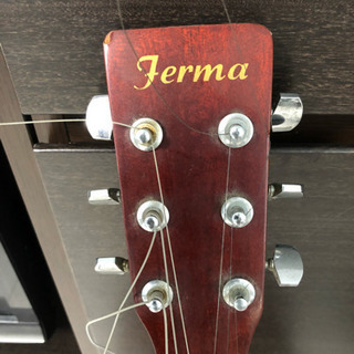 壊れたギターの画像