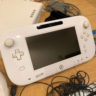 WiiU本体&リモコン&ソフト13本&マリオカートハンドル4個&ヌンチャク2個セットの画像