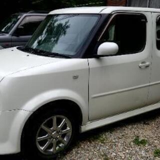 日産　キューブ　白　中古車の画像