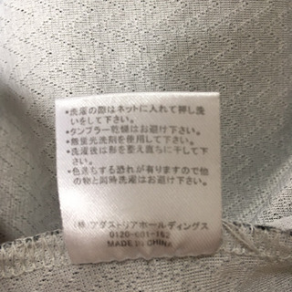 ジーナシス トップスの画像