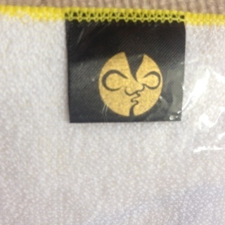【新品 未使用】岡本太郎 ハンカチ ハンカチタオル タオル イエロー 黄色 美術館グッズ ハンドタオル マイクロファイバーの画像