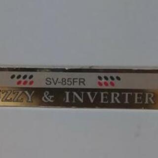 煙突式のストーブの画像